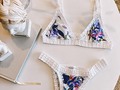 SAKI🪻 // Our white bikini in stock! Coccolobaswimwear.com