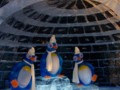 Ice Sculpture three Penguins in an Igloo